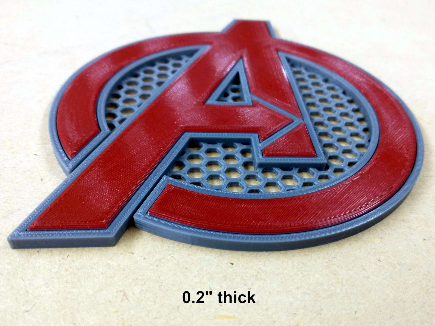 Avenger Emblem with hex mesh background